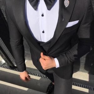 Elegant Black Tuxedo with Bow Tie and Brooch - Men's Formal Attire