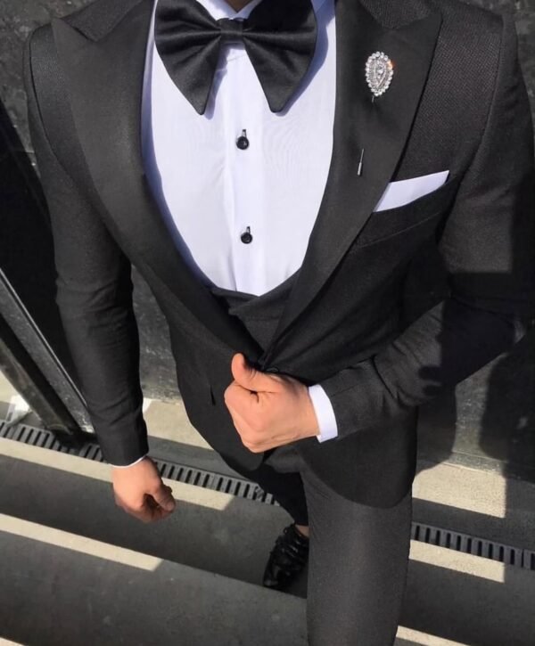 Elegant Black Tuxedo with Bow Tie and Brooch - Men's Formal Attire