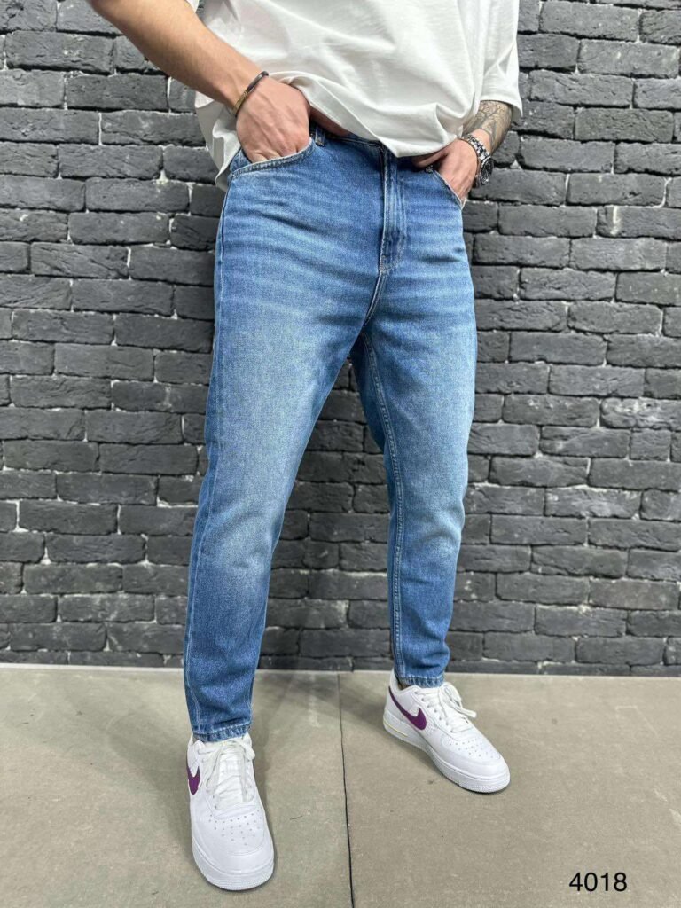 Men’s Tapered Fit Mid-Wash Jeans –