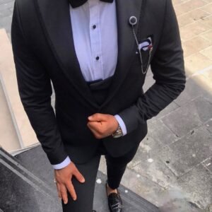 Men's Black Tuxedo with Bow Tie and Chain Accent – Sleek Formalwear for Special Occasions